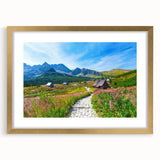 Abstract art print depicting a European scenery in muted earth tones, framed in gold, ideal for dining room decor.