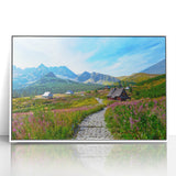 Mid-century modernist art depicting a European cityscape in muted colors on a framed acrylic.