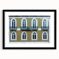 Extra large abstract art print of a colorful, textured Lisbon scenery on a framed black mat, ideal for living room decor.