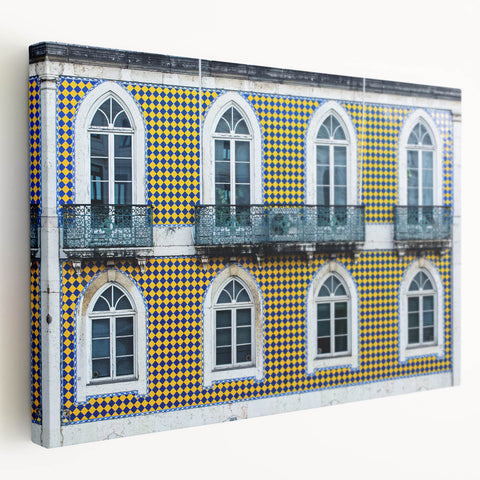 Lisbon cityscape depicted in vibrant hues on a large stretched canvas, suitable for kitchen wall art.