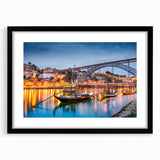 Colorful abstract art print of Porto, featuring vibrant hues on textured canvas, framed in black.