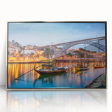 Large art print of Porto, Portugal scenery in muted blue and white tones, framed in silver acrylic.