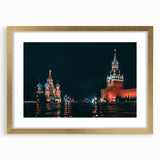 Abstract art print of Moscow skyline in muted gray and blue tones on a gold-framed canvas, suitable for dining room decor.