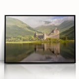 Large abstract wall art depicting a Scottish landscape in muted green and blue tones, framed in black acrylic.