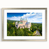 Extra large abstract art print depicting a textured European scenery in muted earth tones, framed in silver.