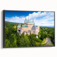 Black and white wall art featuring a vintage poster style landscape of Slovakia on framed canvas, ideal for bedroom decor.