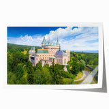 Extra large rolled print of a Slovakian landscape with vibrant green fields and a clear blue sky.