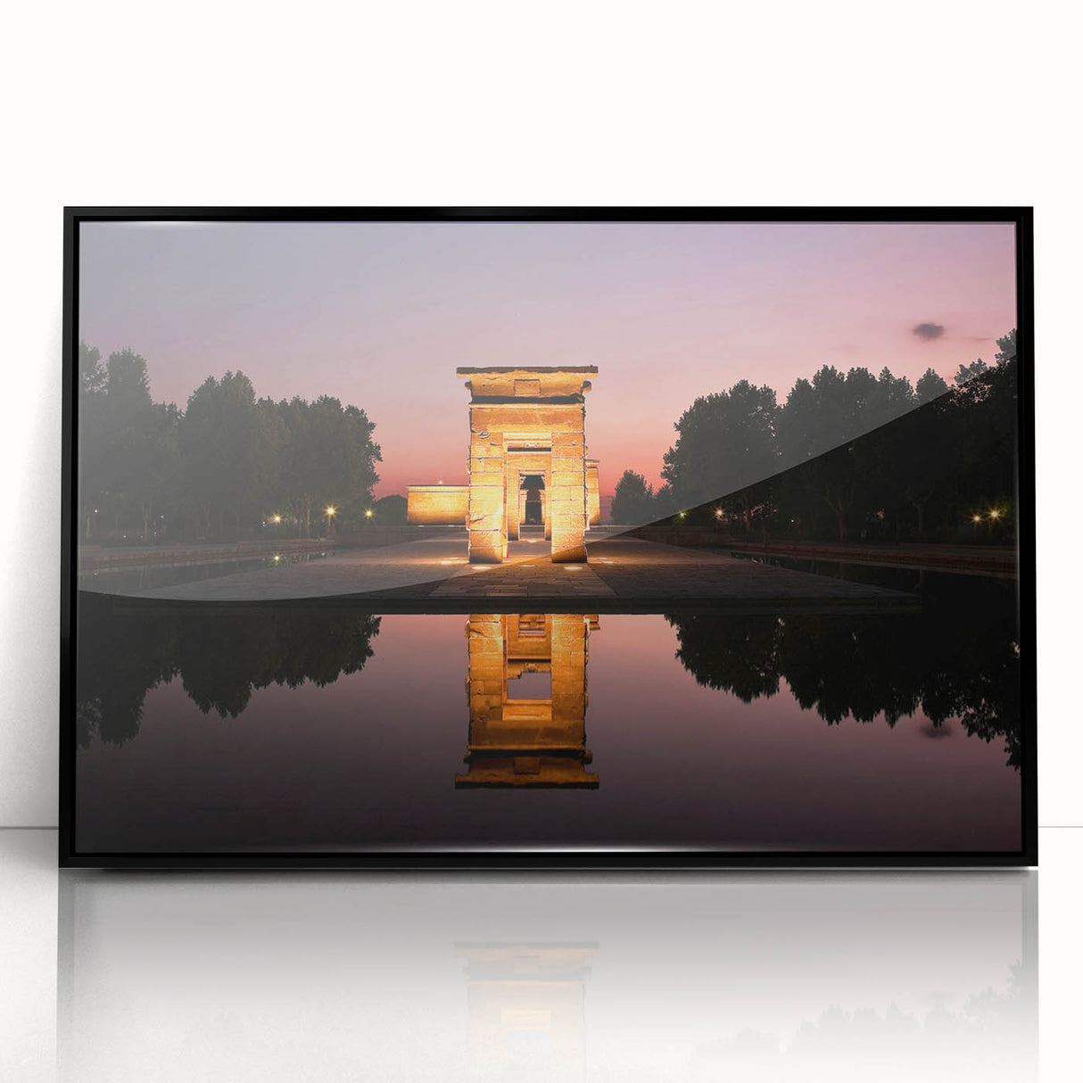 Large abstract wall art depicting the Madrid skyline in muted gray and blue tones on a black-framed acrylic print.