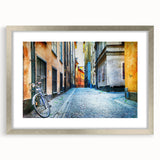 Textured abstract art print of Stockholm scenery in muted blue and gray tones, framed in silver, ideal for bedroom art.