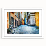 Abstract art print of Stockholm with muted blue and yellow tones on a framed white mat, ideal for dining room decor.