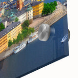 Large abstract wall art on acrylic glass depicting a mid-century modernist European scenery in muted earth tones.