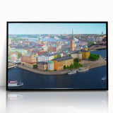 Large abstract wall art depicting a European scenery in muted grays and blues on a framed acrylic.