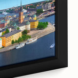 Textured black wall art featuring a vibrant, colorful European scenery on a framed canvas, ideal for living room decor.
