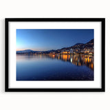 Extra large abstract art print of a colorful Geneva scenery on textured canvas, framed in black, ideal for living room decor.