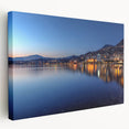 Large canvas print of Geneva skyline in muted blue and gray tones, suitable for kitchen wall art.