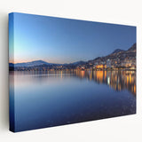 Large canvas print of Geneva skyline in muted blue and gray tones, suitable for kitchen wall art.