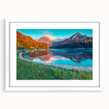 Abstract art print of a Swiss landscape in muted blues and greens on a framed white mat, ideal for dining room decor.