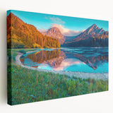 Large art of a Swiss landscape on stretched canvas, featuring lush green valleys and snowy peaks, ideal for kitchen wall art.