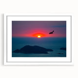 Abstract art print of Acapulco scenery in muted blue and green tones on a framed white mat, suitable for dining room decor.