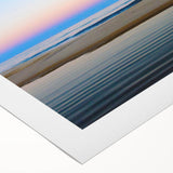 Art deco poster of Cabo San Lucas scenery on rolled canvas with vibrant blue and sandy tones.