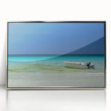 Mid-century modernist art depicting the Cancun coastline in muted blue and green tones on a framed acrylic print.