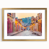 Extra large abstract art print of Mexico City in textured gold frame, using muted earth tones, ideal for living room decor.