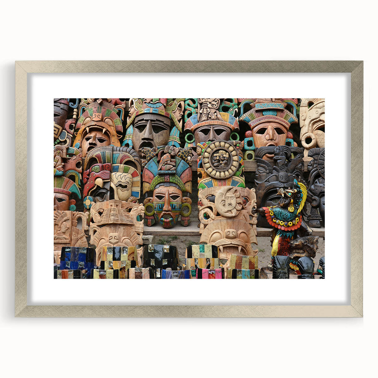 Textured abstract art print depicting Yucatán scenery in muted earth tones, framed in silver, ideal for bedroom ambiance.