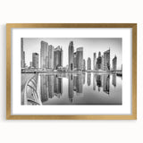 Extra large abstract art print of Dubai skyline in textured gold tones on a framed canvas, ideal for living room decor.