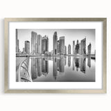 Textured abstract art print of Dubai skyline in muted earth tones, framed in silver, ideal for bedroom art.