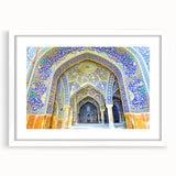 Abstract art print of Middle Eastern scenery in muted earth tones on a white framed mat, suitable for dining room decor.