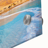 Large abstract depiction of the Dead Sea in muted blue and beige tones on acrylic glass.