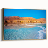 Framed canvas depicting the Dead Sea landscape in muted gold and black tones, suitable for bedroom wall art.
