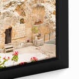 Framed canvas of Jerusalem cityscape in textured black with colorful accents, ideal for living room decor.
