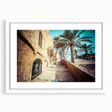 Abstract art print of Tel Aviv skyline in muted gray and blue tones on a framed white mat, ideal for dining room decor.