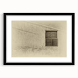 Extra large abstract art print of a colorful Middle Eastern scenery on a textured canvas, framed in black.