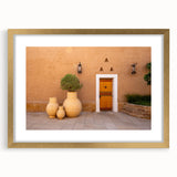 Extra large abstract art print of a textured Middle Eastern scenery in gold frame, ideal for living room decor.