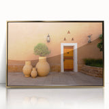 Large art print of a Saudi Arabian scenery in gold tones, framed acrylic, mid-century modernist style.