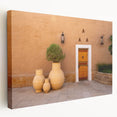 Stretched canvas depicting a scenic Middle Eastern landscape in muted earth tones, ideal for kitchen wall art.