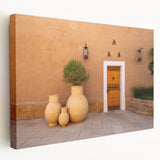 Stretched canvas depicting a scenic Middle Eastern landscape in muted earth tones, ideal for kitchen wall art.