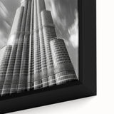 Extra large framed canvas of the Burj Khalifa in black with colorful, textured detailing, suitable for living room decor.