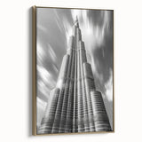 Framed canvas featuring a landscape painting of the Burj Khalifa in gold and black tones, ideal for bedroom wall art.