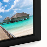 Framed canvas of a textured Fiji seascape in vibrant blues and greens, ideal for living room decor.