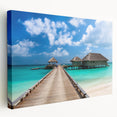 Side view of a large stretched canvas depicting the serene Fiji coastline in soft blue and green hues.