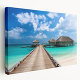 Side view of a large stretched canvas depicting the serene Fiji coastline in soft blue and green hues.