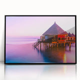 Large abstract wall art featuring the serene Tahiti coastline in muted blue and green tones, framed in black acrylic.