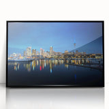 Large abstract wall art depicting the Auckland skyline in muted blue tones on a framed acrylic panel.