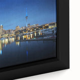 Extra large framed canvas featuring a textured depiction of Auckland's skyline in black with colorful accents.