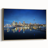 Framed canvas depicting the Auckland skyline in black and gold tones, suitable for bedroom wall art.