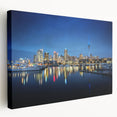 Auckland cityscape at dusk with soft pink and purple sky on stretched canvas, suitable for kitchen wall art.