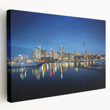Auckland cityscape at dusk with soft pink and purple sky on stretched canvas, suitable for kitchen wall art.